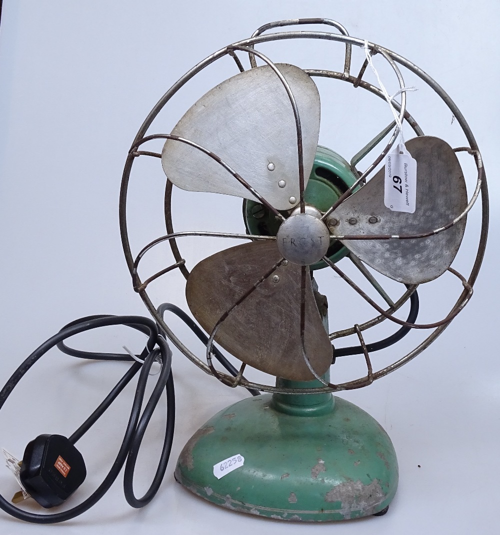 A Vintage Frost green-enamelled electric fan, height 14"