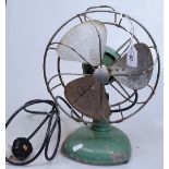 A Vintage Frost green-enamelled electric fan, height 14"