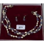A triple-strand cultured pearl and blue glass necklace and earring set, necklace length 430mm (2)