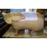 A hand made pitch pine life size pig, with hessian body, L110cm