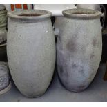 A pair of tall textured terracotta planters pots, H94cm