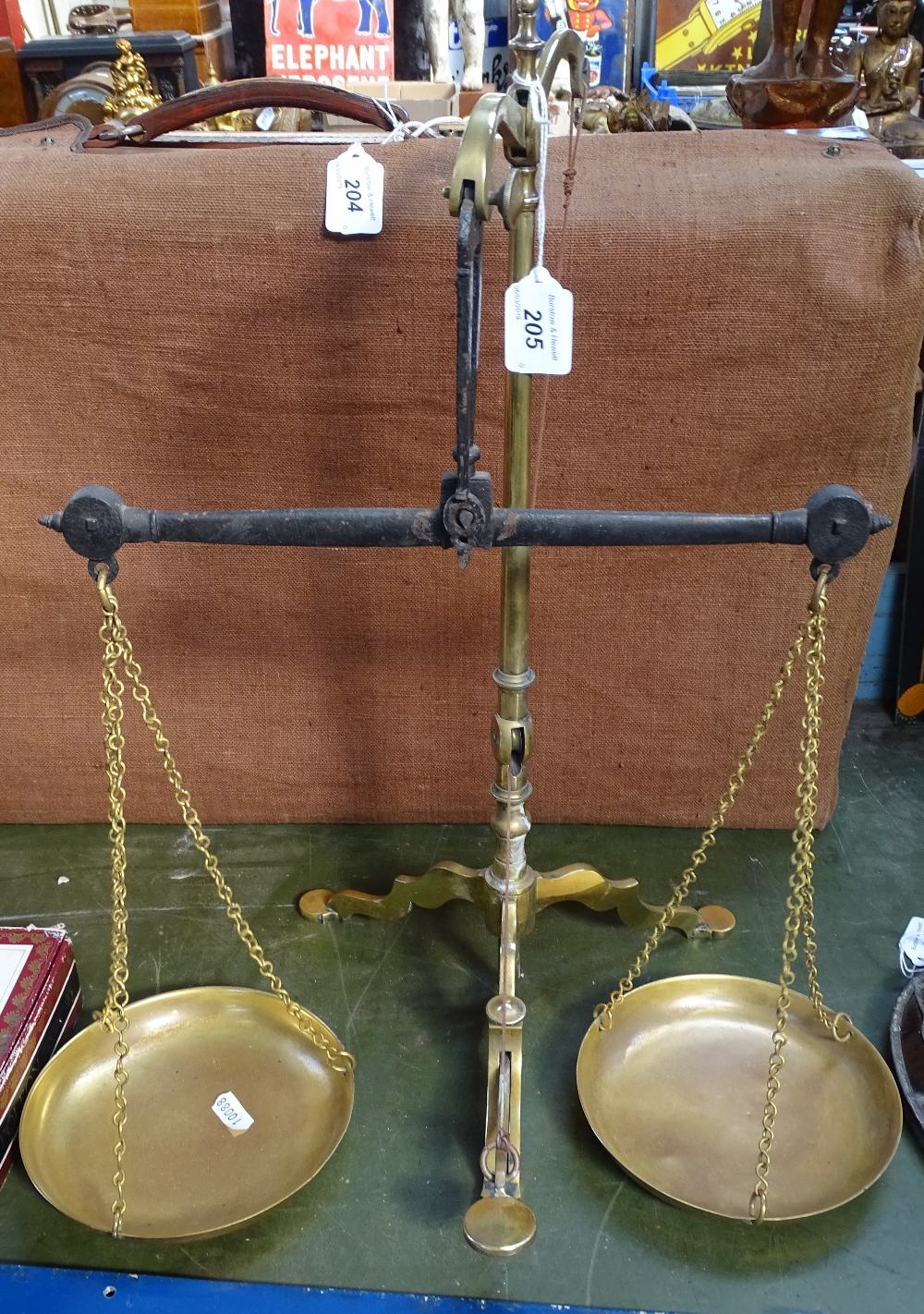 A pair of 19th century brass tobacco scales and weights