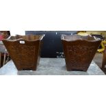 A pair of stained teak planters, with card decoration, W34cm, H33cm