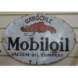 A Vintage enamel advertising sign for Gargoyle Mobiloil Vacuum Oil Company, width 21"