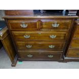 An Edwardian stained pine 5 drawer chest, on bracket feet, W106cm