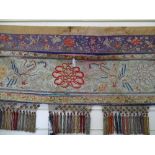 A Chinese crewel silk embroidered wall hanging, with exotic bird and deer designs, and tasseled