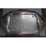 A silver plated and engraved oval tea tray, with pierced gallery, and another