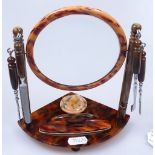 A Vintage Bakelite manicure set on mirror stand, height 7.5"