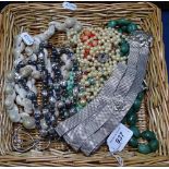 A tray of costume jewellery, to include shell necklace, assimilated pearl necklaces with silver