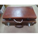 2 leather suitcases