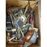 A box of brass and copper items