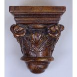 An Antique carved wood corbel/bracket, height 7.25"