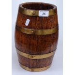 A small ornamental brass-bound oak barrel, height 10"