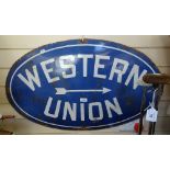 An Antique Western Union oval enamel advertising sign, 33" across