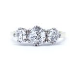 An 18ct gold 3-stone diamond ring, total diamond content over 1ct, setting height 6.6mm, size M, 3.