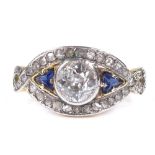 An Art Deco sapphire and diamond cluster dress ring, unmarked gold settings, central stone approx