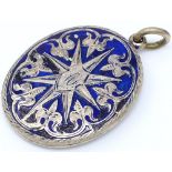A yellow metal and blue enamel mourning pendant, with hair panel back, height excluding bale 37mm,