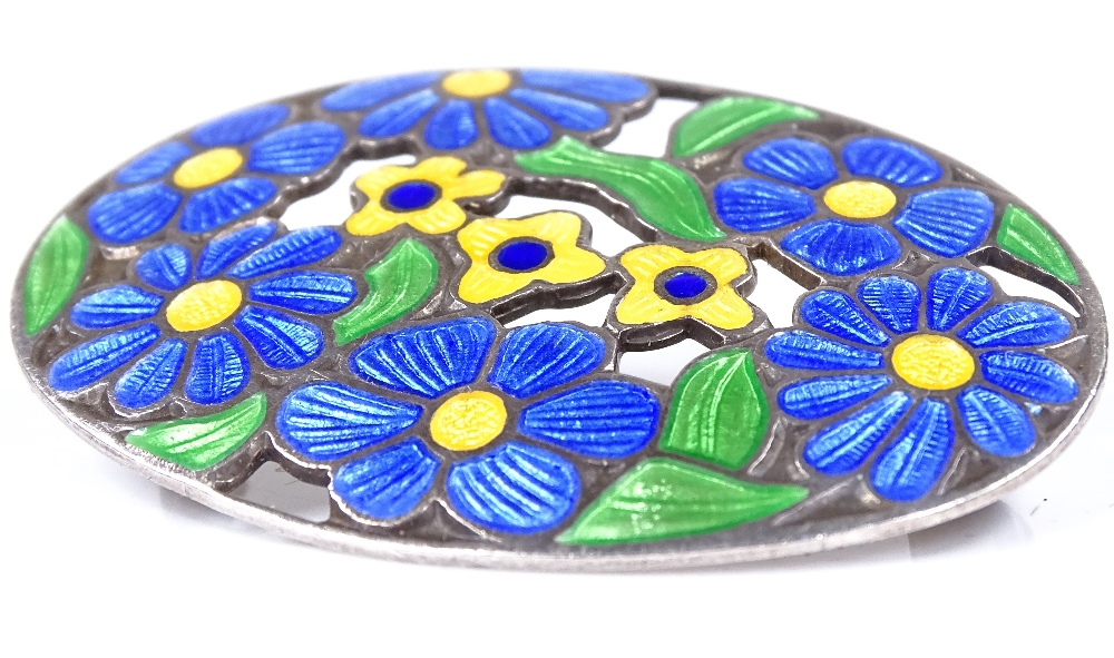 An Arts and Crafts silver and coloured enamel oval brooch, with floral decoration, maker's marks D - Image 2 of 4