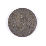 A 1933 German silver medallion commemorating Hitler's accession to power