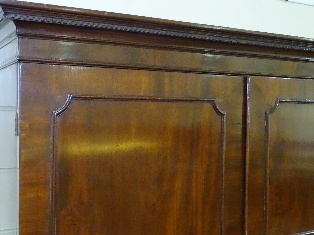 A mid-19th century flame veneer mahogany linen press, moulded panelled doors enclosing linen slides, - Image 3 of 4
