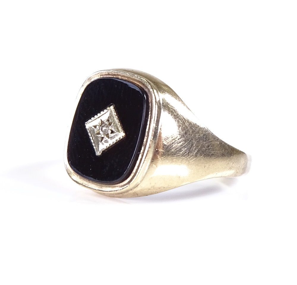 A 9ct gold onyx and diamond set signet ring, setting height 14.6mm, size S, 3.3g - Image 2 of 4