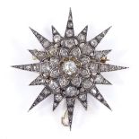 A large Victorian 9ct gold diamond set starburst brooch, diameter 39.4mm, 10.1g