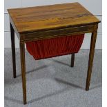 A 19th century rosewood work table, with inlaid boxwood stringing, and sewing bag below, 2' x 16"