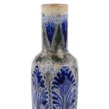 A Martin Brothers Fulham Pottery narrow-necked vase, incised blue and green leaf decoration, incised