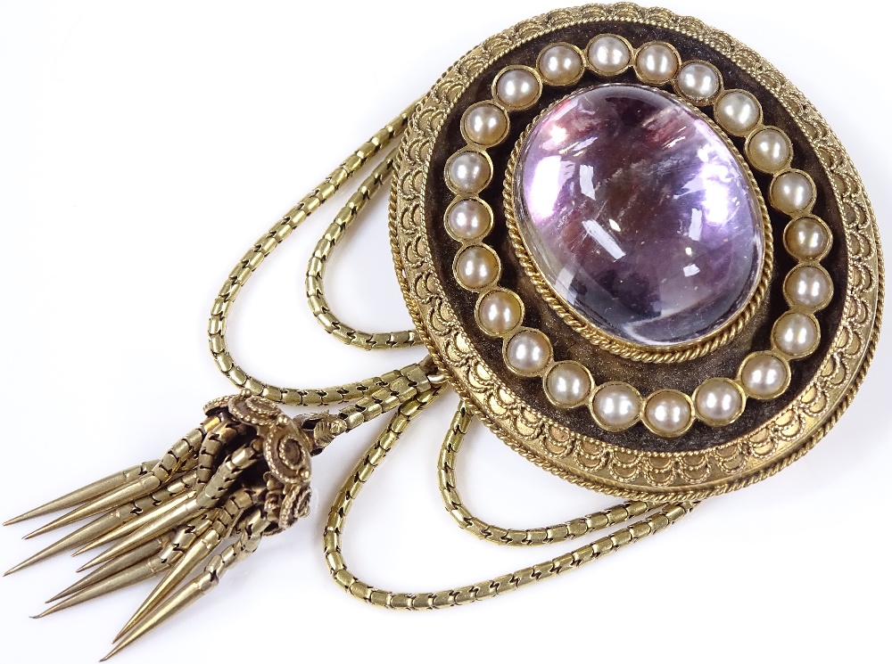 A Victorian oval memorial brooch, with foil-back domed cabochon rock crystal centre, surrounded by - Image 2 of 4