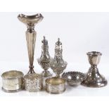Various silverware, including a pair of pepperettes, a bud vase, napkin rings etc