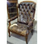 A 19th century mahogany-framed reclining libraryCclub chair, with original buttoned leather