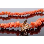 An unusual coral bead necklace, with yellow metal bee brooch, brooch length 18.7mm (2)