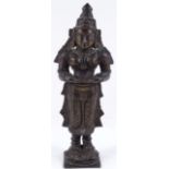 An Antique Indian patinated bronze standing figure of a god, height 24cm