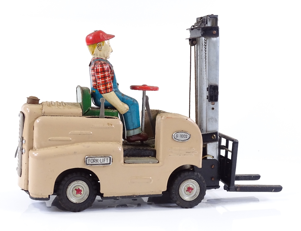 A Japanese tinplate battery operated toy forklift truck, length 27cm - Image 2 of 3