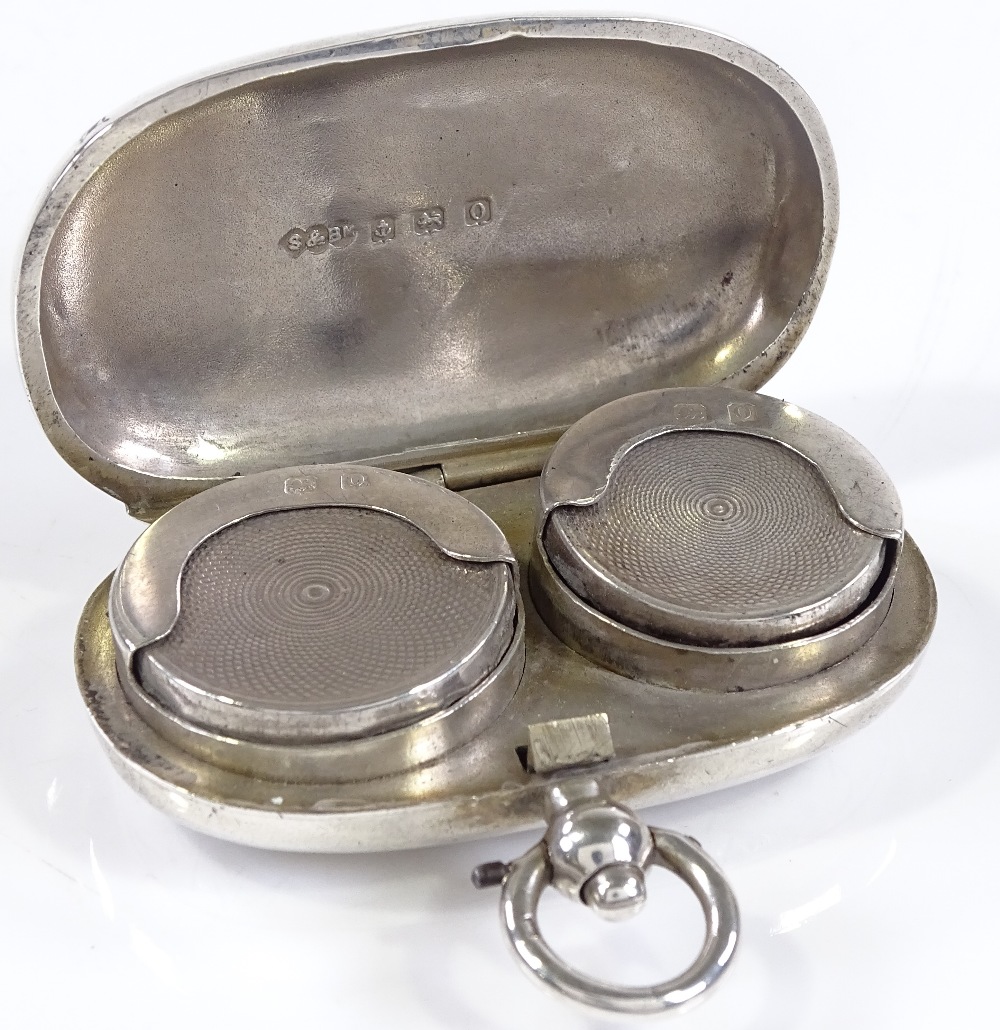 An oval silver sovereign and half sovereign case, with engraved leaf decoration, by Smith & Bartlam, - Image 3 of 3