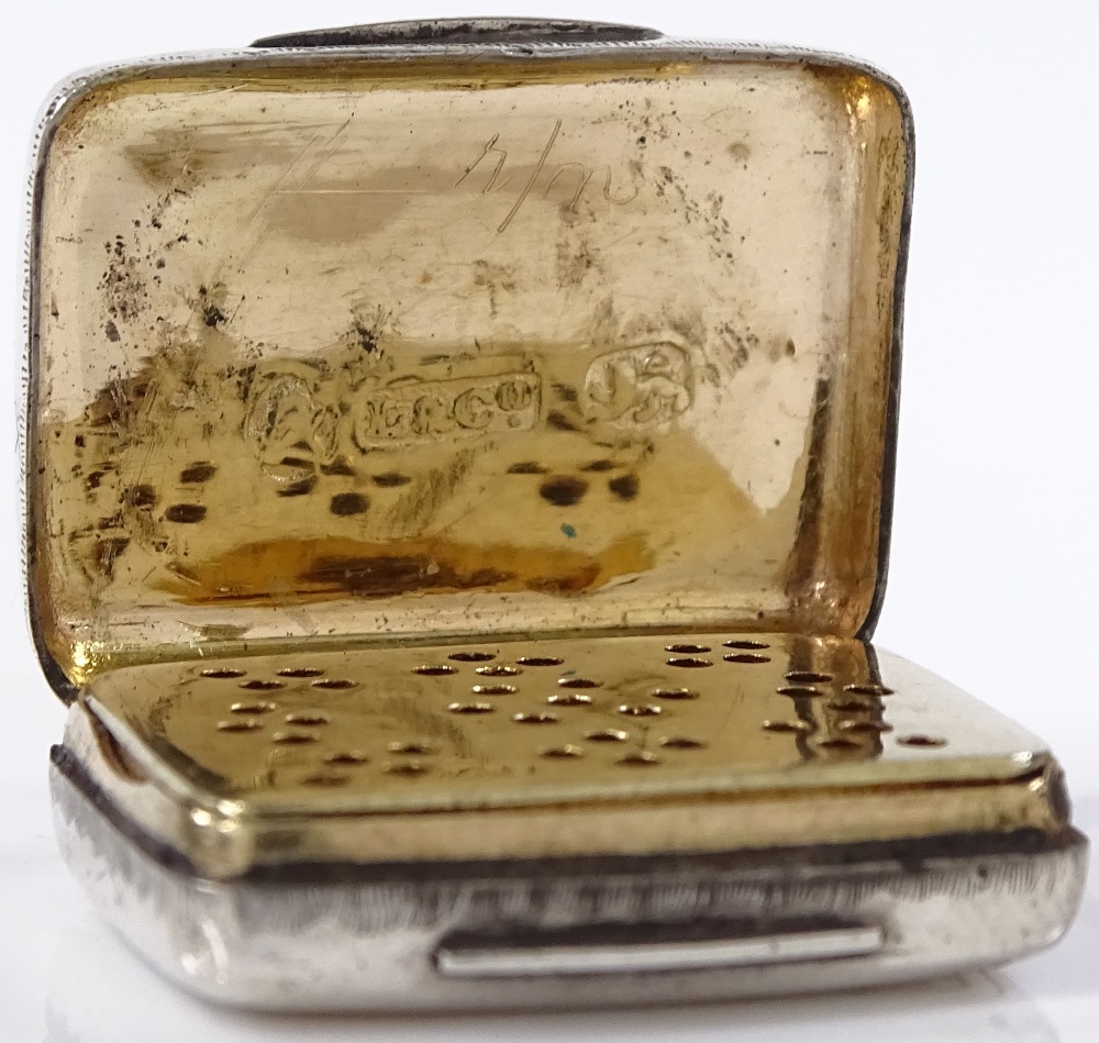 A miniature rectangular silver vinaigrette, with circular pierced grille and floral engraved - Image 3 of 3