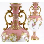 A pair of Royal Doulton bone china baluster vases, with hand painted floral decoration, signed E