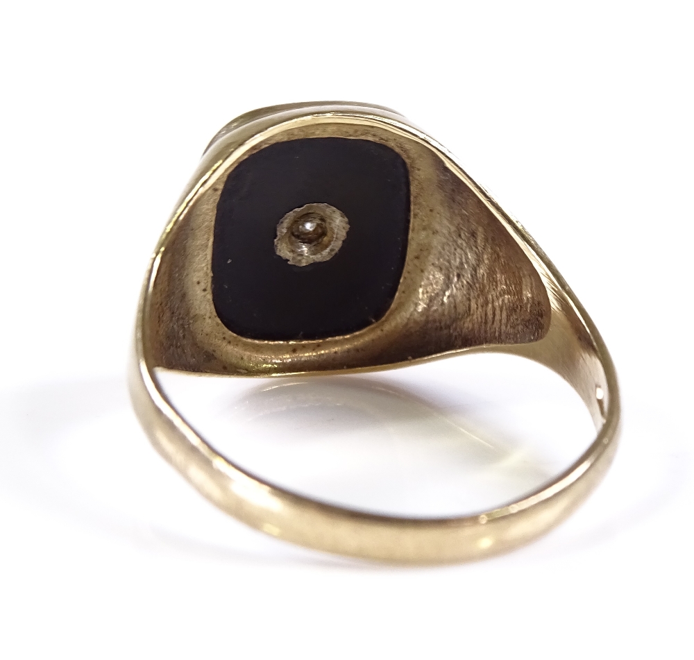 A 9ct gold onyx and diamond set signet ring, setting height 14.6mm, size S, 3.3g - Image 3 of 4