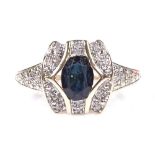 A 9ct gold sapphire and diamond cluster dress ring, total diamond content approx 0.1ct, setting