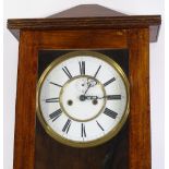 A 19th century mahogany-cased Vienna regulator wall clock, with enamel dials