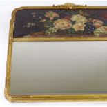 An ornate Continental carved giltwood-framed wall mirror, with inset oil painting on canvas,
