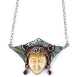 An Art Deco style face mask pendant necklace, set with garnets, rubies, citrine and abalone shell,
