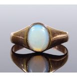 An 8ct gold cabochon white opal signet ring, setting height 9.4mm, size N, 2.2g