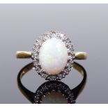 A Victorian 18ct gold opal and diamond cluster ring, setting height 12.3mm, size L, 3.3g