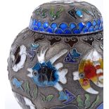A Japanese white metal and cloisonne enamel jar and cover, with tropical fish design, height 10cm