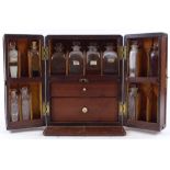 A 19th century mahogany apothecary cabinet, with recessed brass carrying handle, the interior fitted