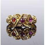 An 18ct gold ruby and diamond dress ring, setting height 7.6mm, size J, 2.5g