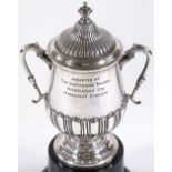 A silver 2-handled trophy, of half fluted form, by James Deakin & Sons, hallmarks Sheffield 1904,