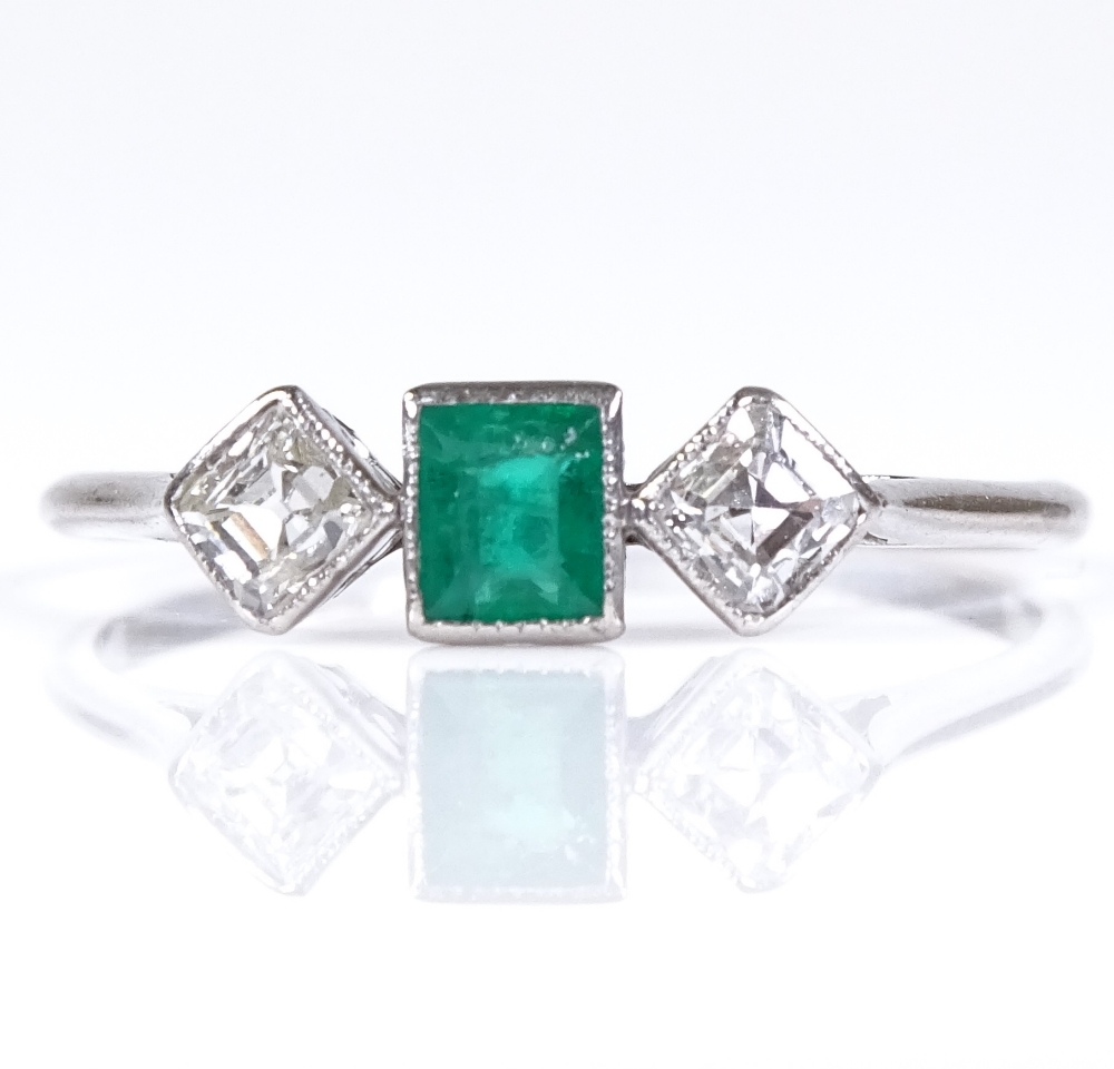 An Art Deco 3-stone emerald and diamond ring, platinum setting, setting height 4.5mm, size O, 1.8g