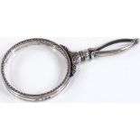 A sterling silver magnifying glass frame, with stylised floral handle, maker's marks GI, model no.